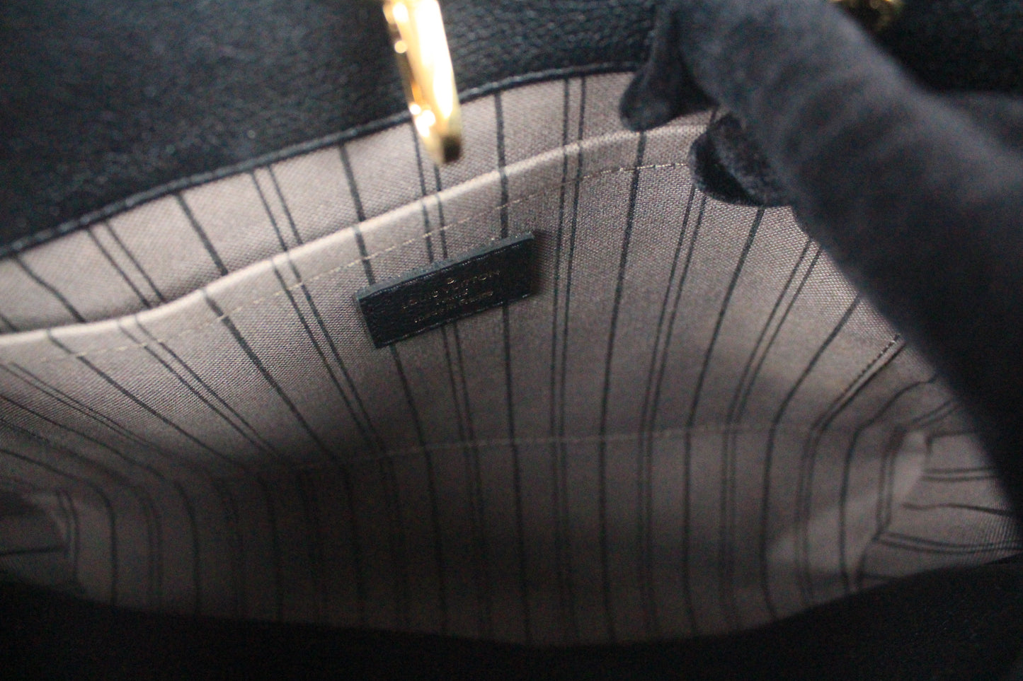 LOUIS VUITTON EMPREINTE MONTAIGNE MM HANDBAG