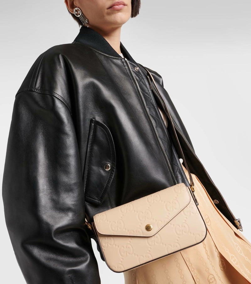 GUCCI GG SUPER MINI EMBOSSED SHOULDER BAG