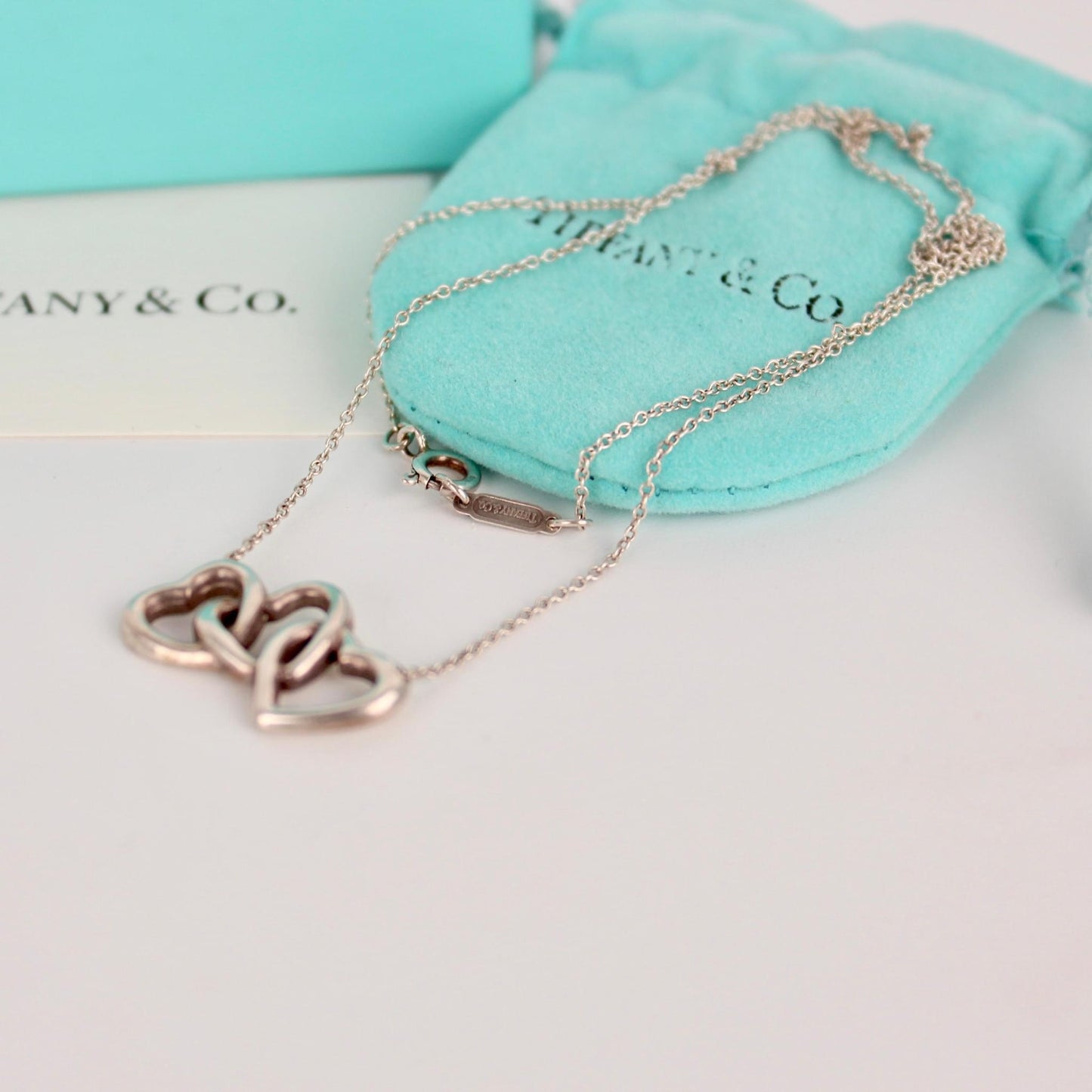 TIFFANY & CO TRIPLE HEART NECKLACE