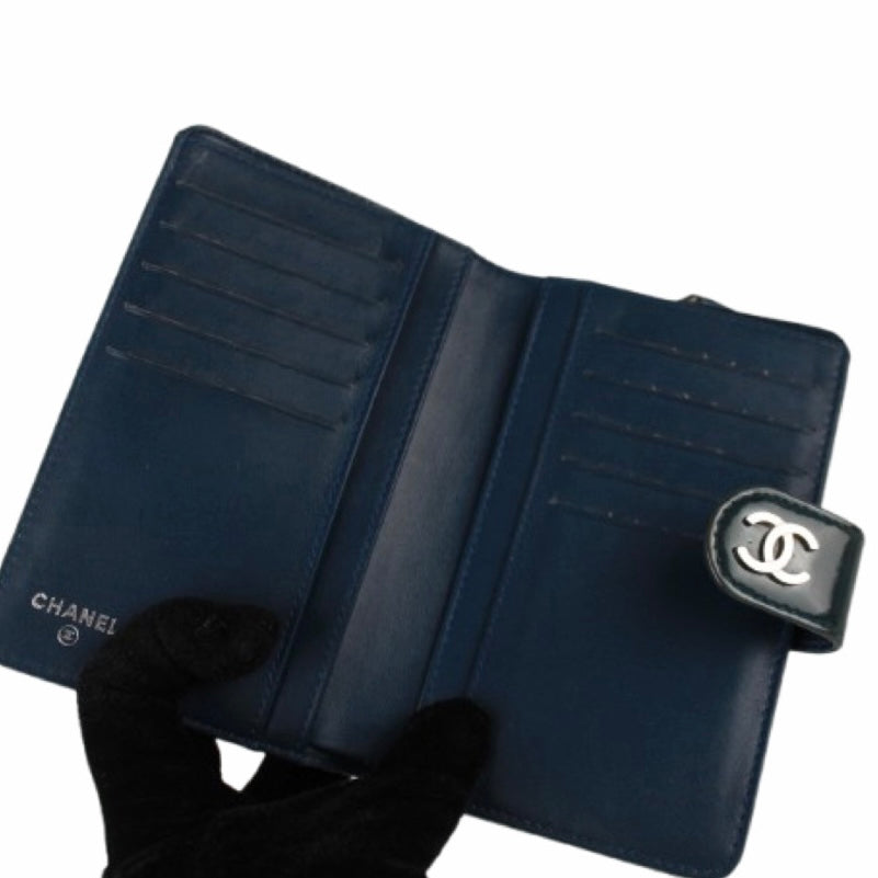 CHANEL PATENT CAMELLIA FOLDING WALLET
